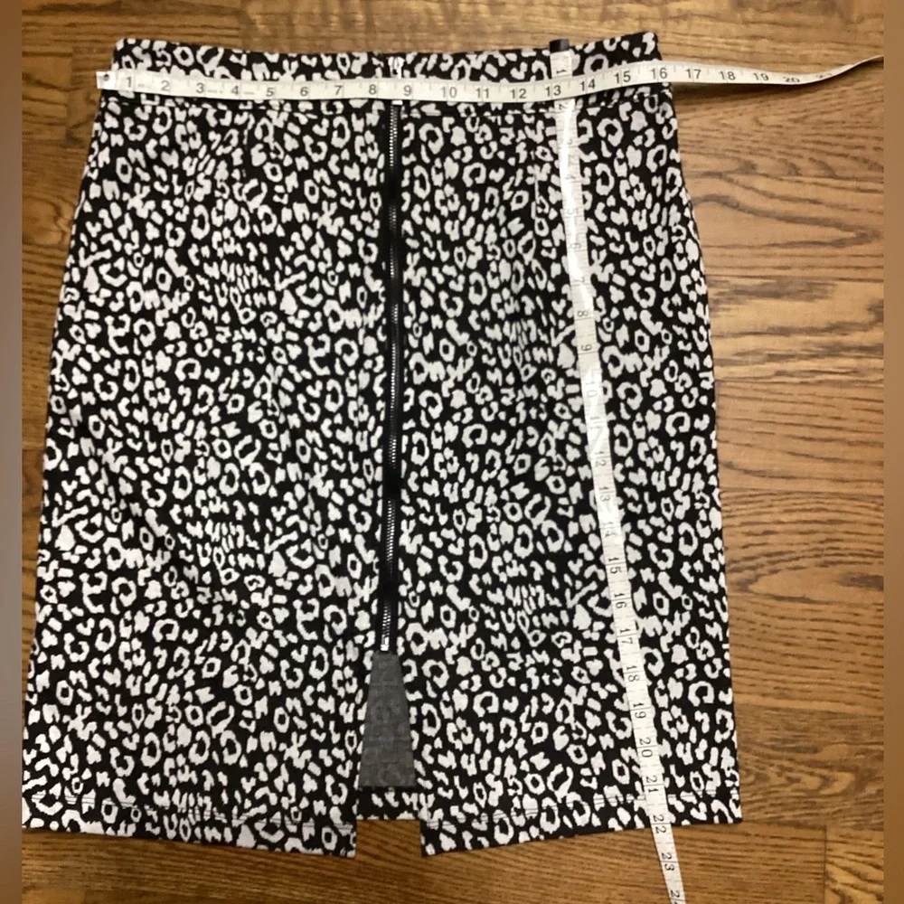 Tribal pencil skirt Back Zip Black and white leopard print. Size Medium